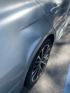 Before repair - panel dent